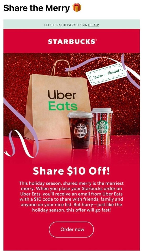 Screen capture of an email from Starbucks advertising their "Share the Merry" Uber Eats deal with a red background, white text and an image of an Uber Eats bag with two Starbucks drinks in front.